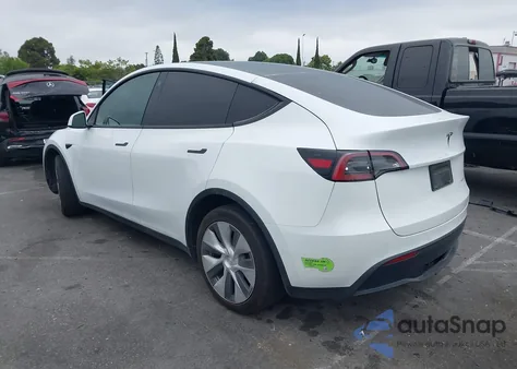 2023 Tesla Model Y Awd/Long Range Dual Motor All-Wheel Drive z USA, uszkodzony, nr VIN 7SAYGAEEXPF582955